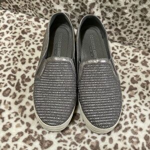 Sketchers slip on shoes. Very comfortable